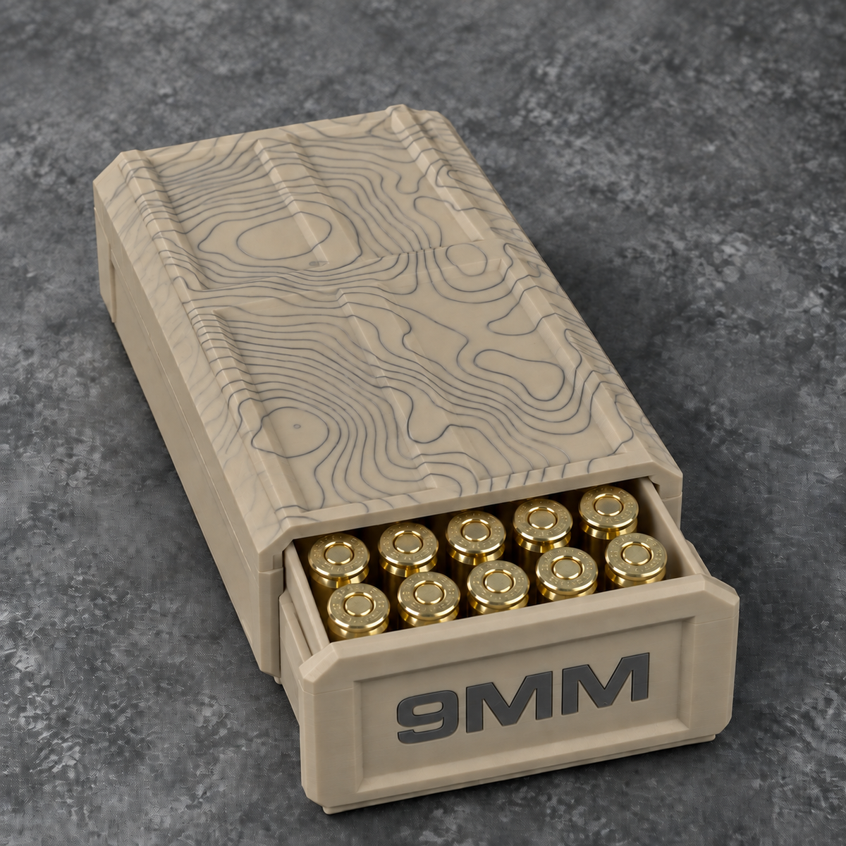 Khaki 9MM topographic ammo storage box open with ten cartridges shown; ammunition not included