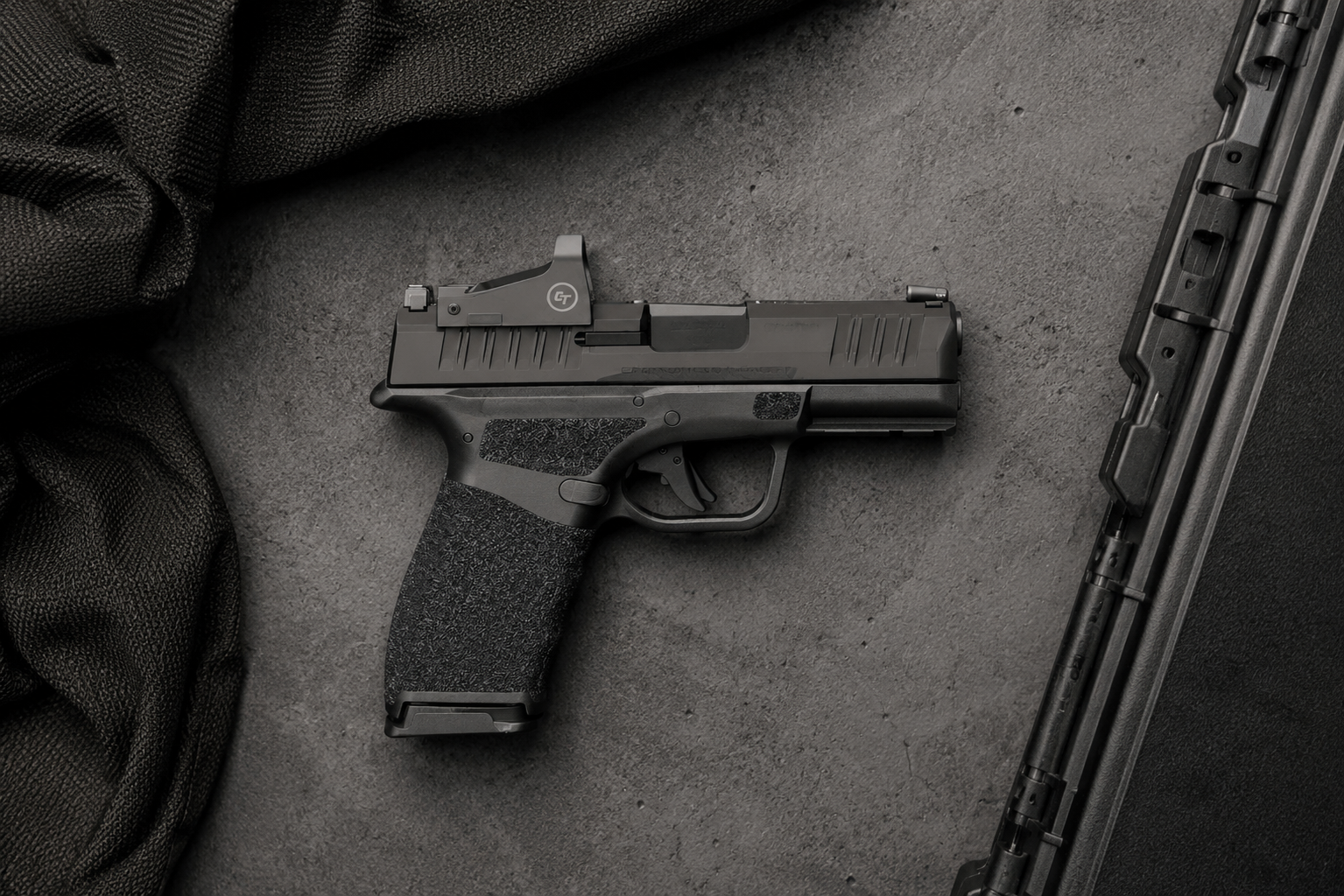 Springfield Hellcat Pro on dark surface