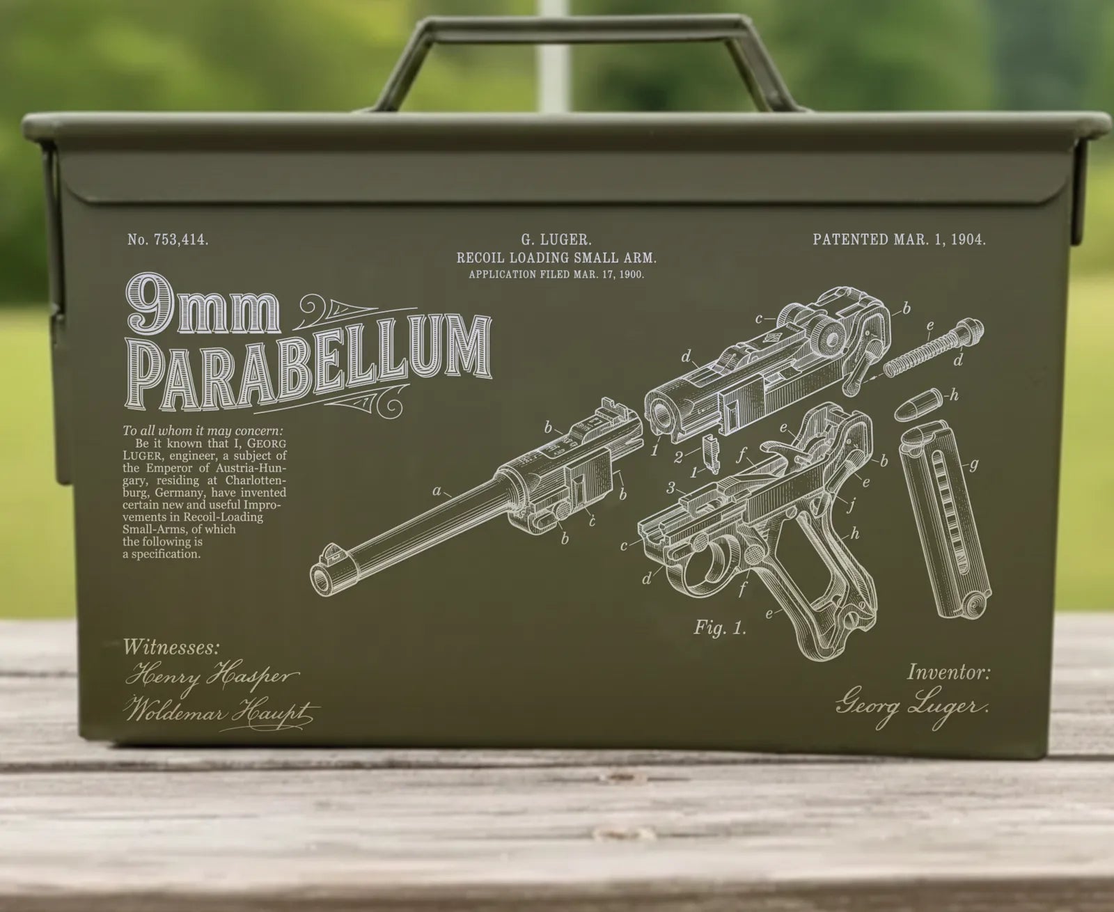 Front of the 9mm Parabellum engraved ammo can: Luger's patent header, the 9mm PARABELLUM title, an exploded pistol drawing and the signatures