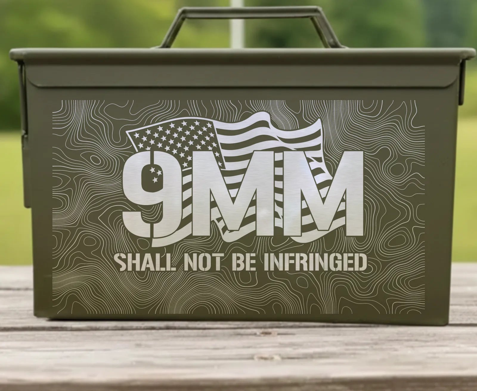 Front of the Shall Not Be Infringed 9mm engraved ammo can: stencil 9MM with the flag through the letters, SHALL NOT BE INFRINGED, over topo lines